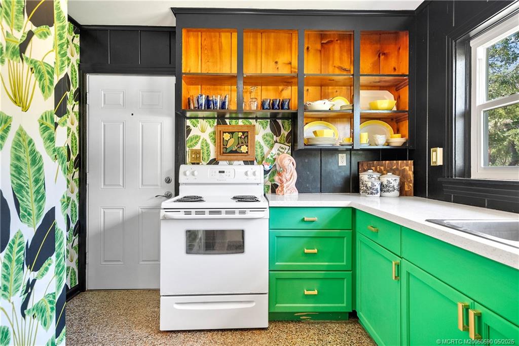 109 North Sewalls Point Road Stuart, FL 34996 - Photo 19 of 33 a kitchen with a sink and a large window