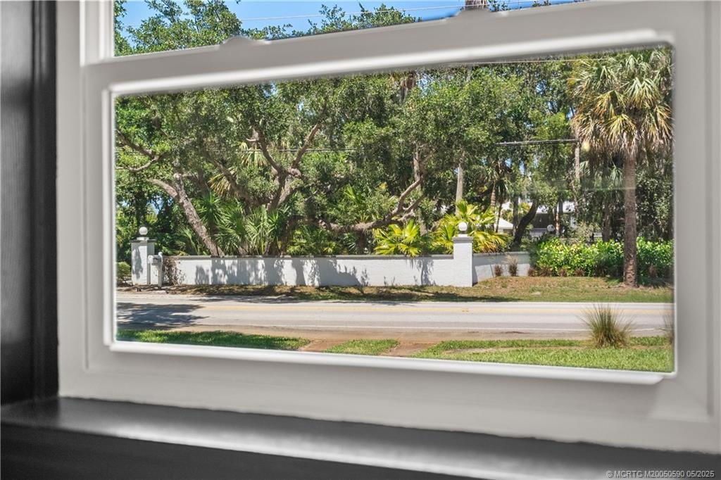 109 North Sewalls Point Road Stuart, FL 34996 - Photo 20 of 33 a view of a living room and a floor to ceiling window