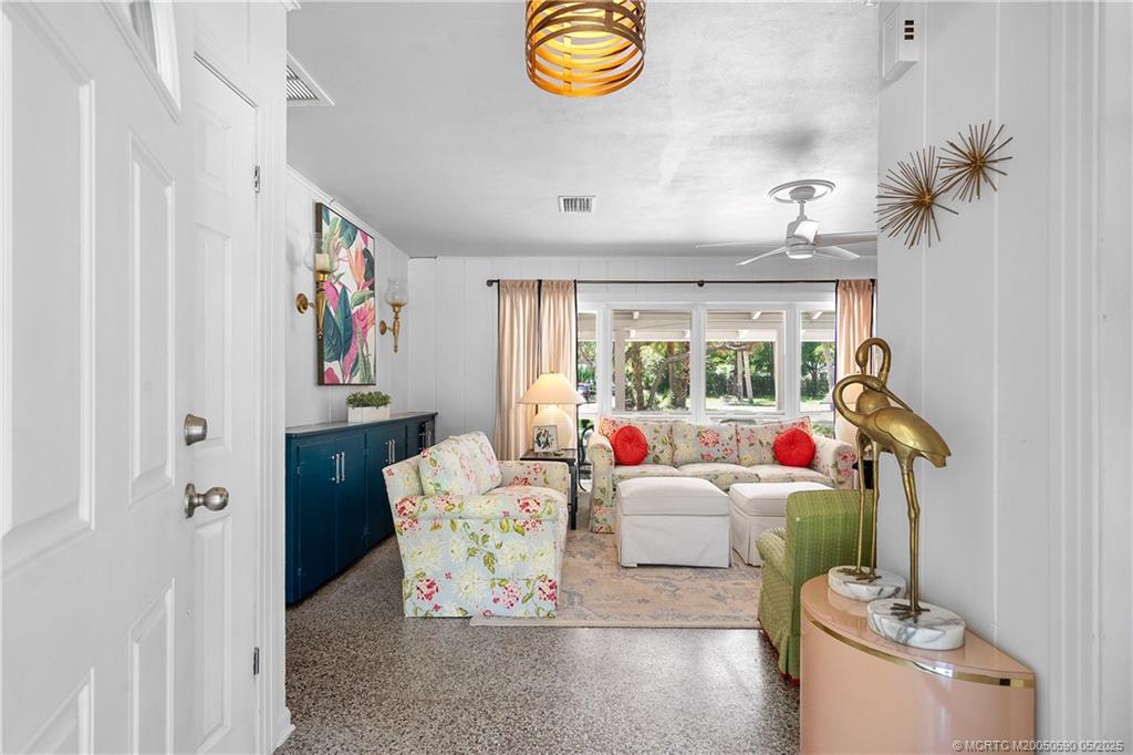 109 North Sewalls Point Road Stuart, FL 34996 - Photo 6 of 33 a living room with furniture and a window