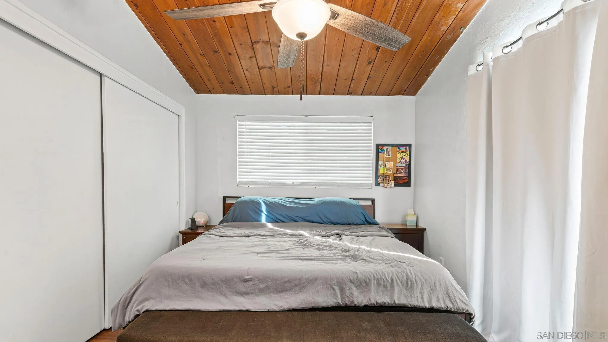 9144 Fanita Rancho Road Santee, CA 92071 - Photo 15 of 28 a bedroom with a bed and a window