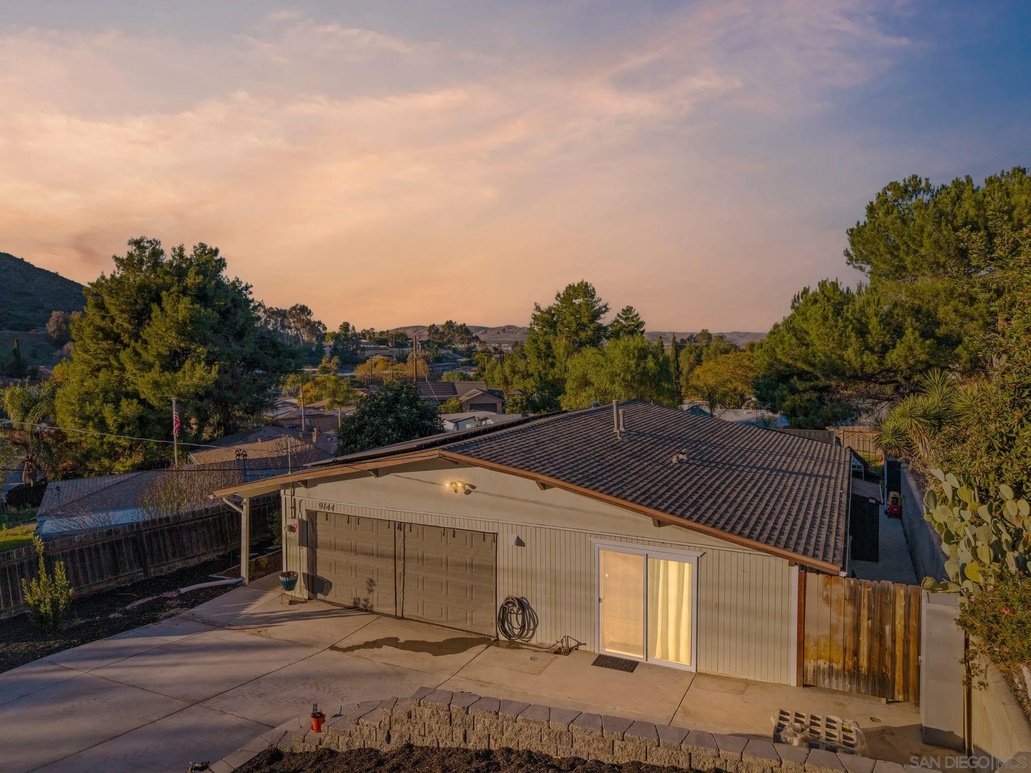 9144 Fanita Rancho Road Santee, CA 92071 - Photo 26 of 28 a view of house with outdoor space and parking