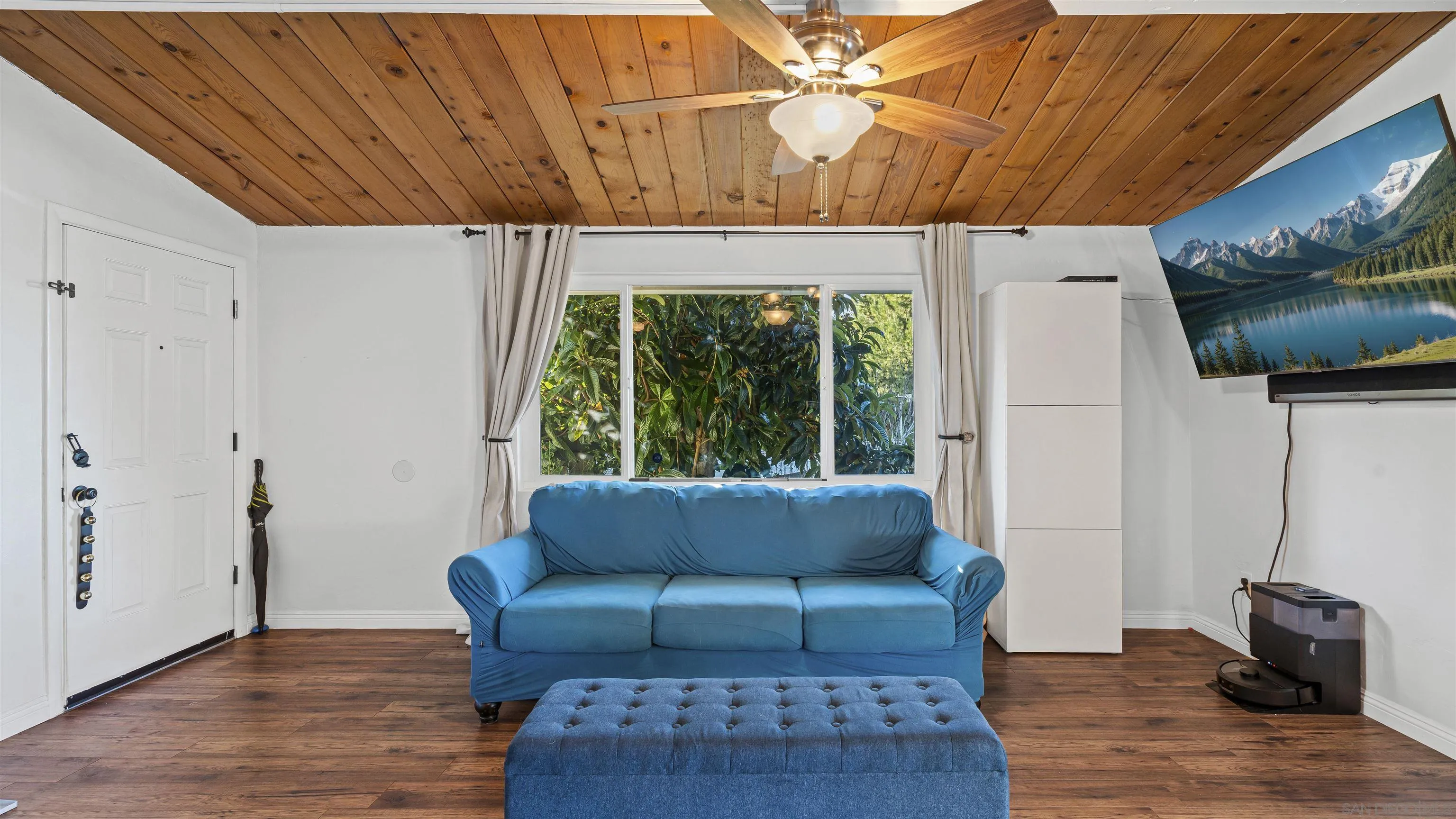 9144 Fanita Rancho Road Santee, CA 92071 - Photo 9 of 28 a living room with furniture and a large window