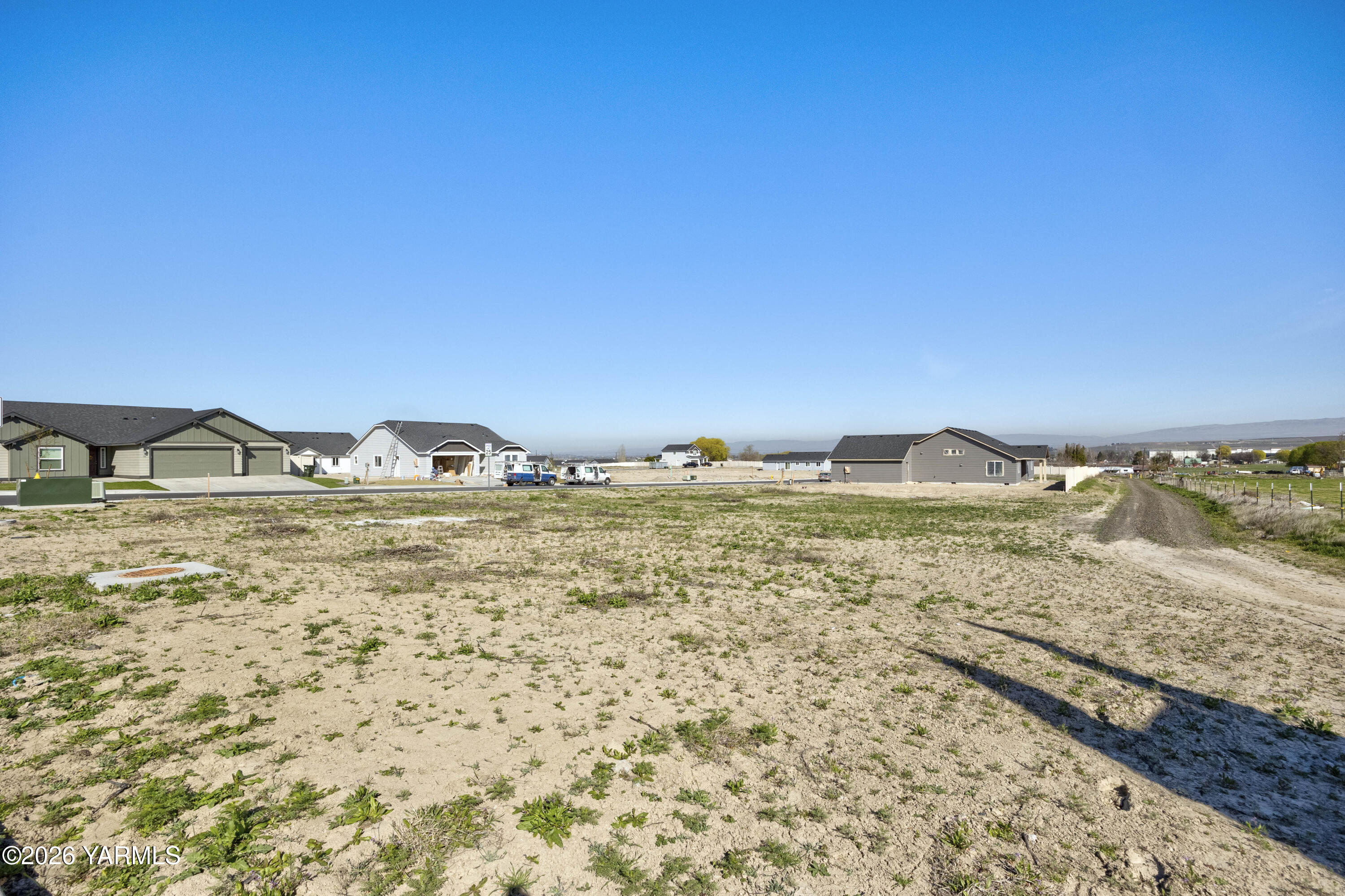 Tbd Tbd Blanton's Loop Grandview, WA 98930 - Photo 3 of 9 a view of a lake with a mountain in the background