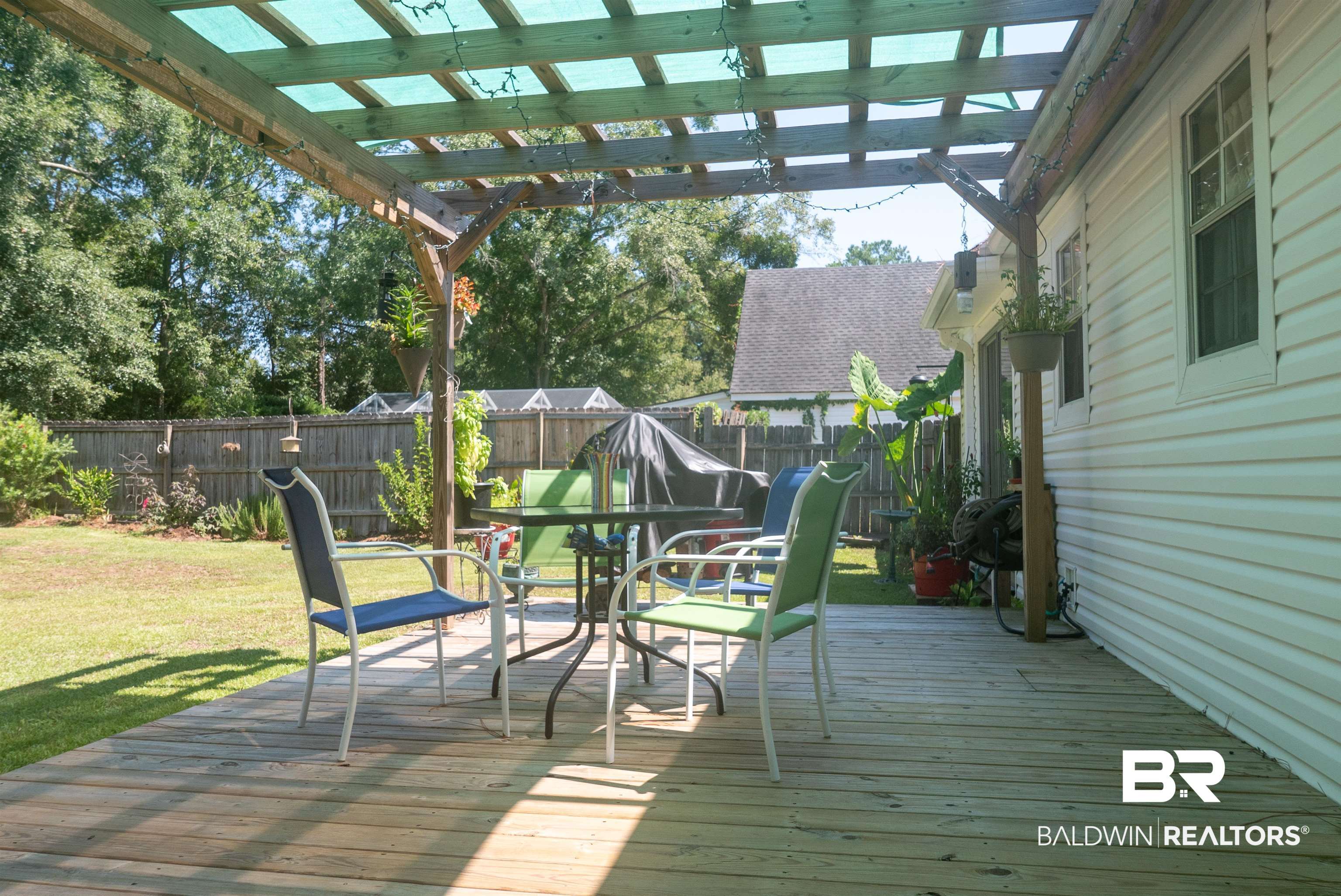 630 Spanish Main Daphne, AL 36527 - Photo 27 of 40 Wooden deck with a pergola and a yard