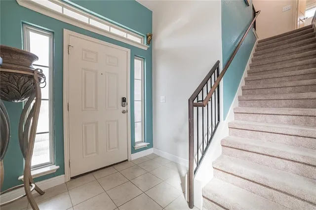 a view of an entryway with stairs