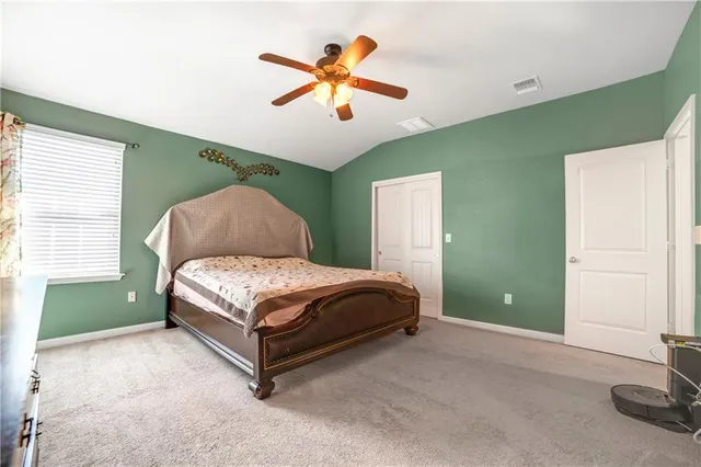 a bathroom with a shower and a sink