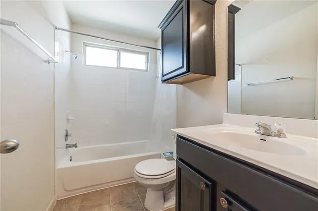 a bedroom with a bed and closet