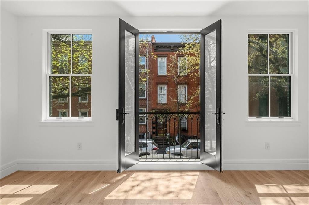 147 Luquer Street, Unit 1 Brooklyn, NY 11231 - Photo 7 of 26 Doors to juliet balcony in bedroom