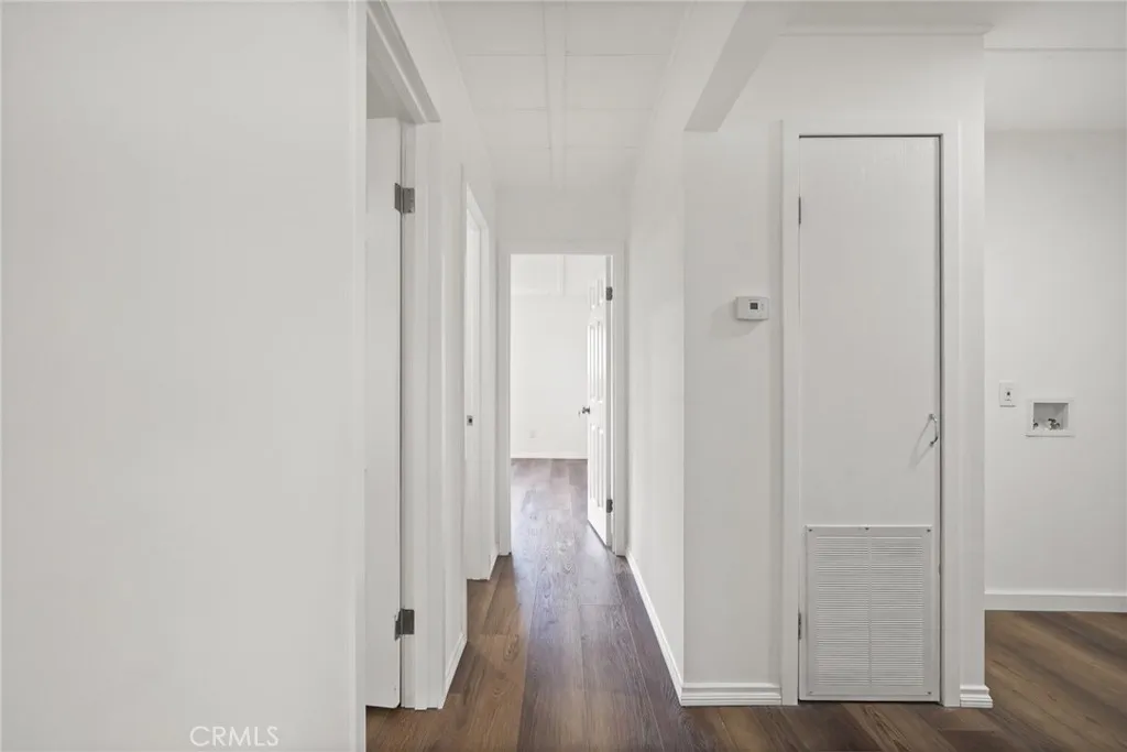 3033 E Valley, Unit 89 West Covina, CA 91792 - Photo 21 of 55 a view of a hallway with wooden floor