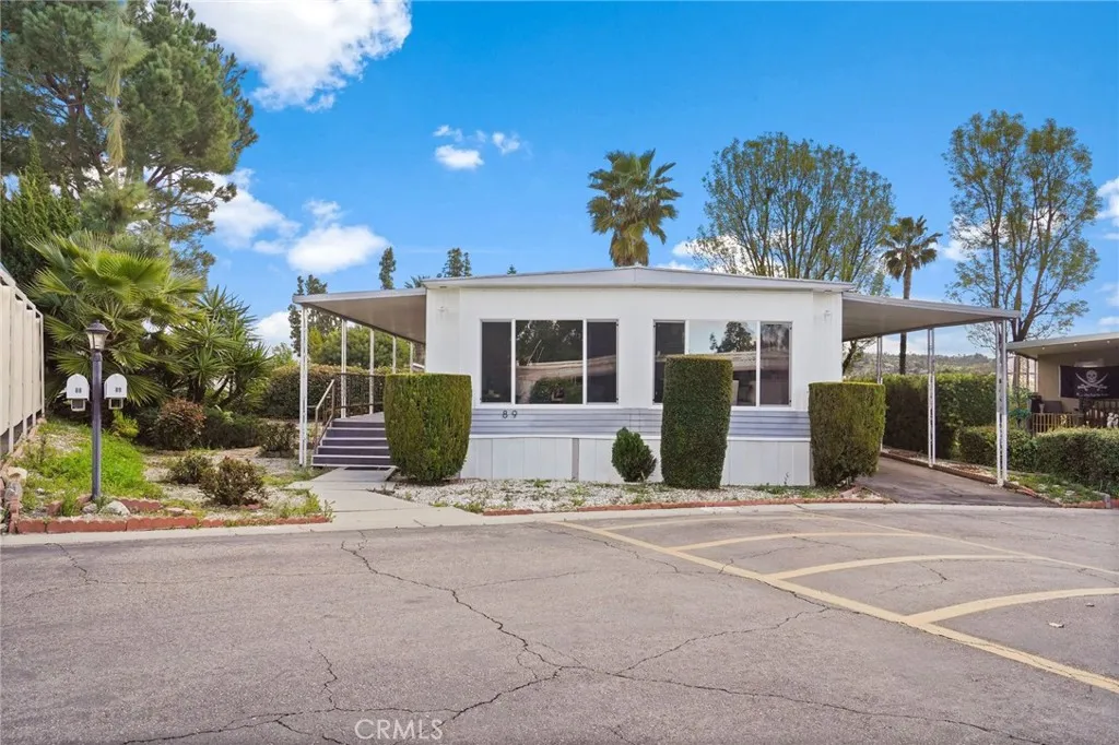3033 E Valley, Unit 89 West Covina, CA 91792 - Photo 4 of 55 a view of a house with a patio
