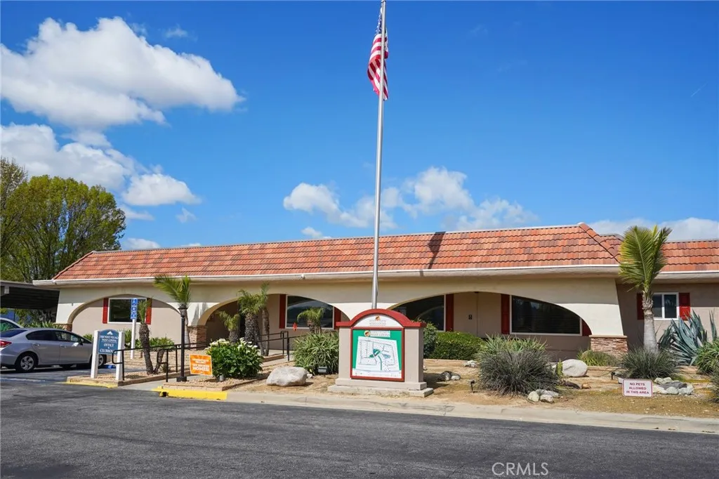 3033 E Valley, Unit 89 West Covina, CA 91792 - Photo 51 of 55 a view of a building with sitting area