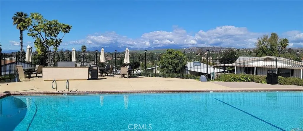3033 E Valley, Unit 89 West Covina, CA 91792 - Photo 55 of 55 a view of a swimming pool and a yard