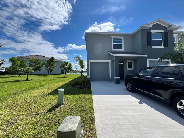a house view with a garden space