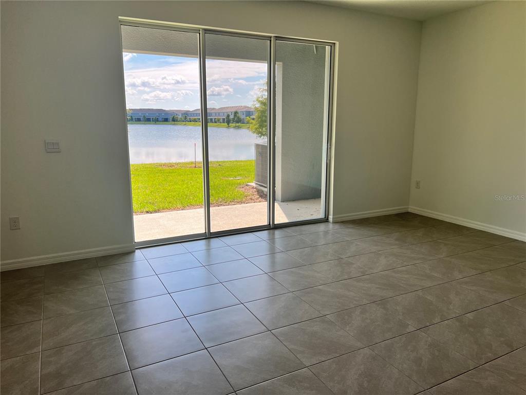 137 Mangrove Shade Circle Apollo Beach, FL 33572 - Photo 14 of 31 a view of an empty room and window