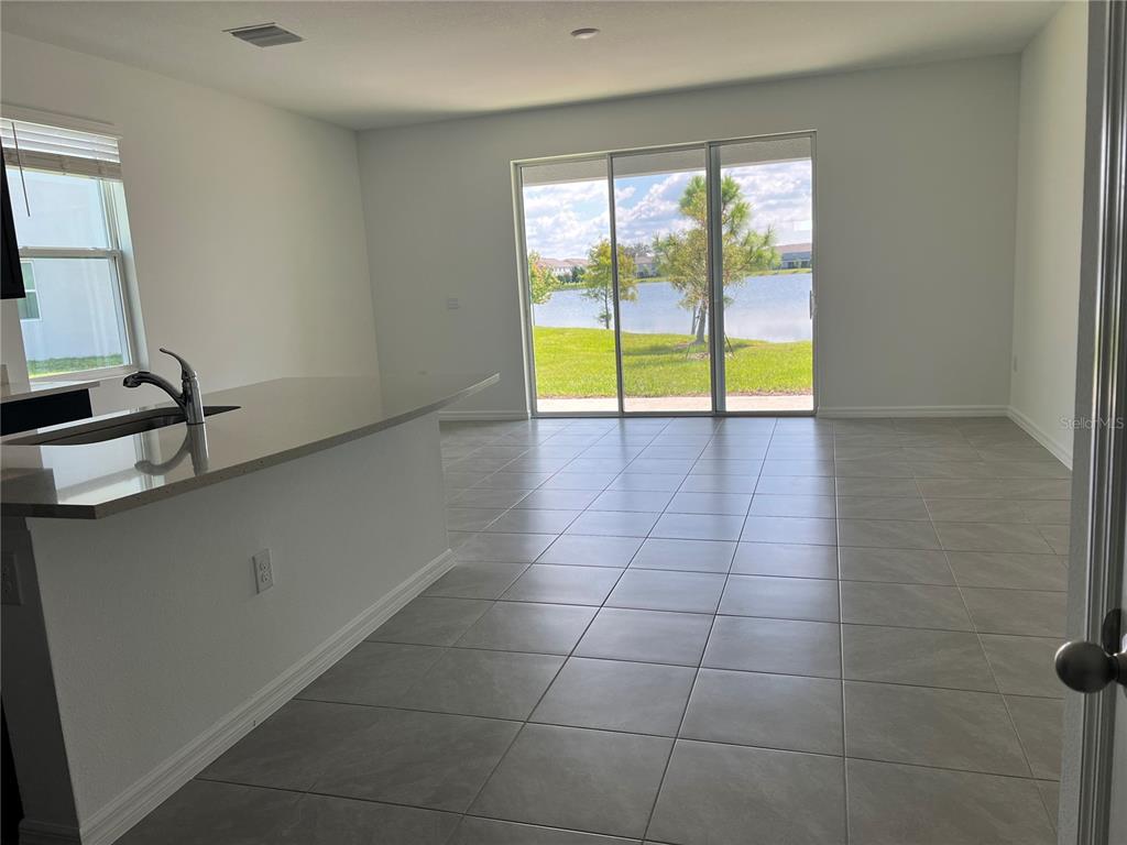 137 Mangrove Shade Circle Apollo Beach, FL 33572 - Photo 17 of 31 a view of an empty room and window