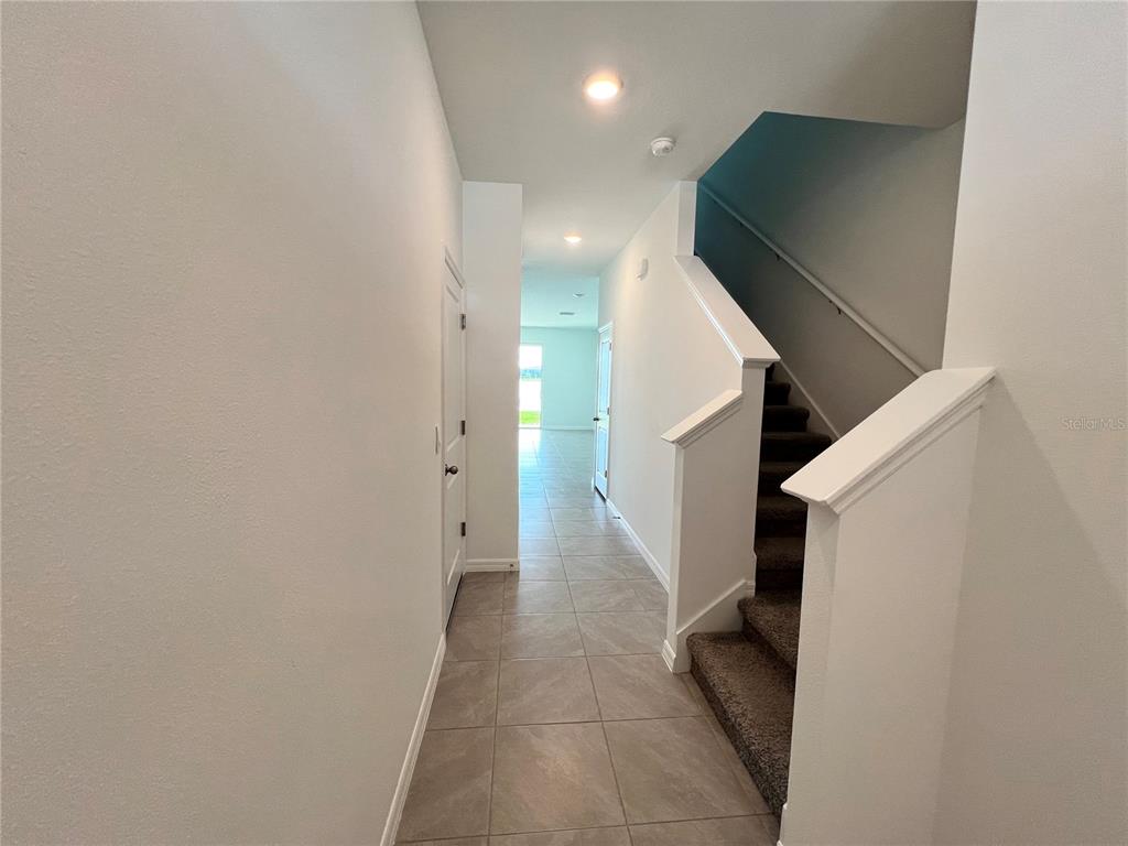 137 Mangrove Shade Circle Apollo Beach, FL 33572 - Photo 18 of 31 a view of a hallway with entryway