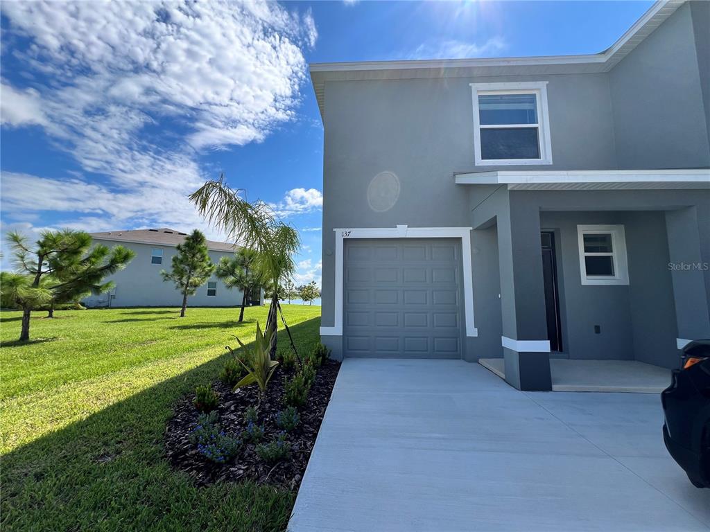 137 Mangrove Shade Circle Apollo Beach, FL 33572 - Photo 2 of 31 a view of a back yard of the house