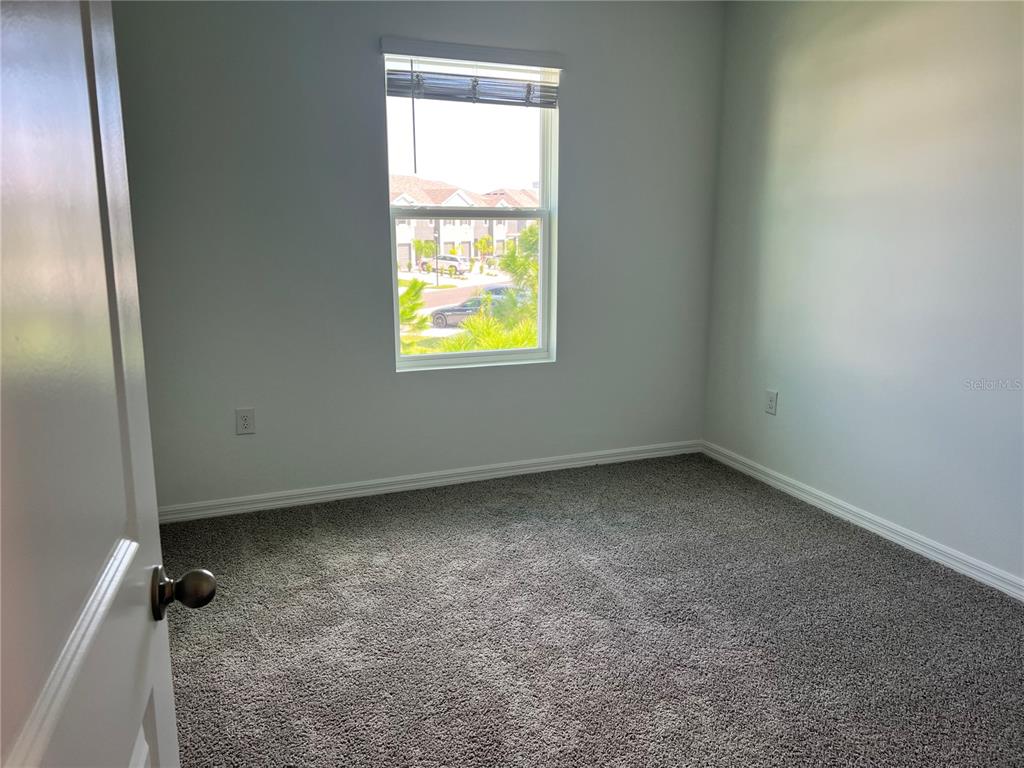 137 Mangrove Shade Circle Apollo Beach, FL 33572 - Photo 22 of 31 a view of an empty room with a window