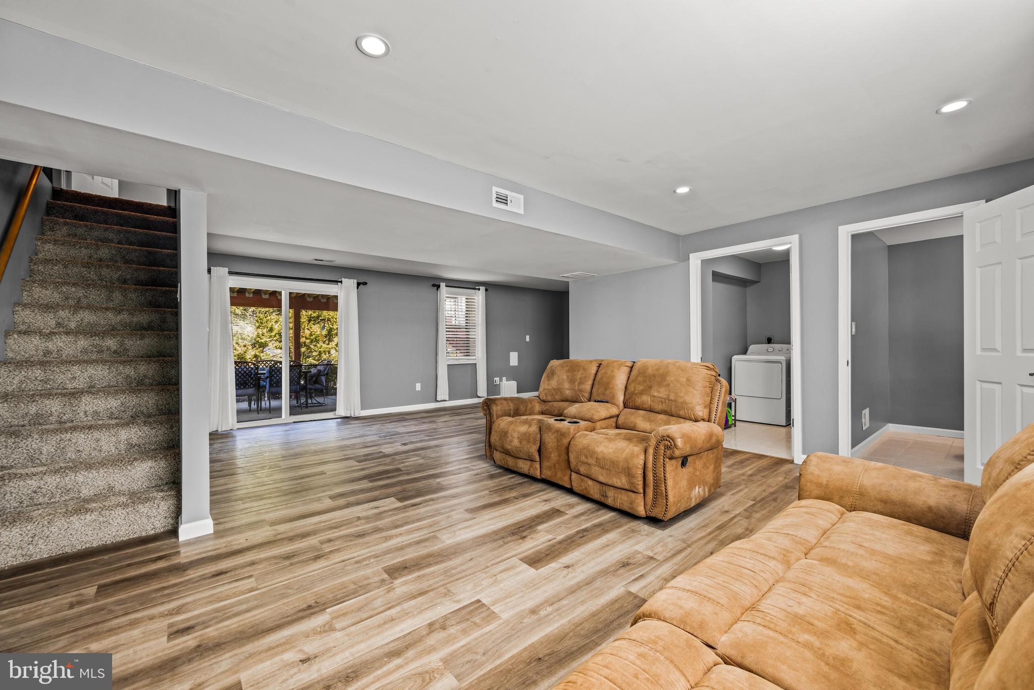 141 Pine Trail Delta, PA 17314 - Photo 21 of 44 a living room with furniture and a fireplace