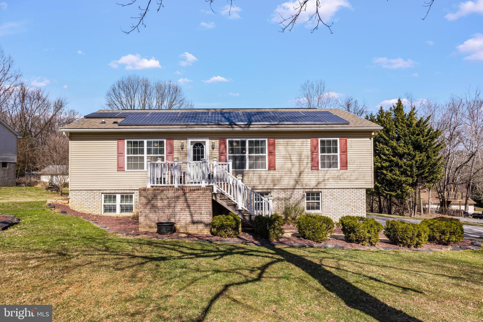 141 Pine Trail Delta, PA 17314 - Photo 3 of 44 a front view of a house with a yard