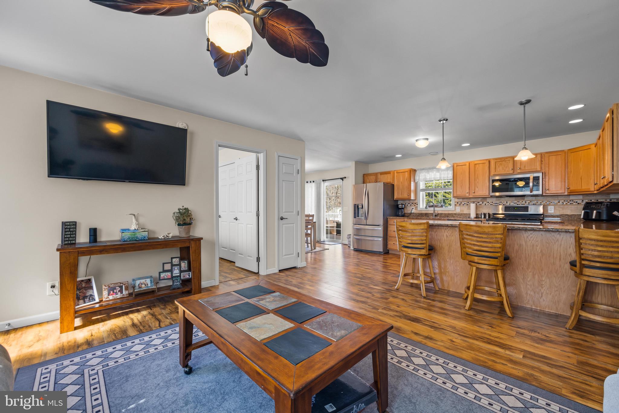 141 Pine Trail Delta, PA 17314 - Photo 4 of 44 a living room with furniture and a flat screen tv