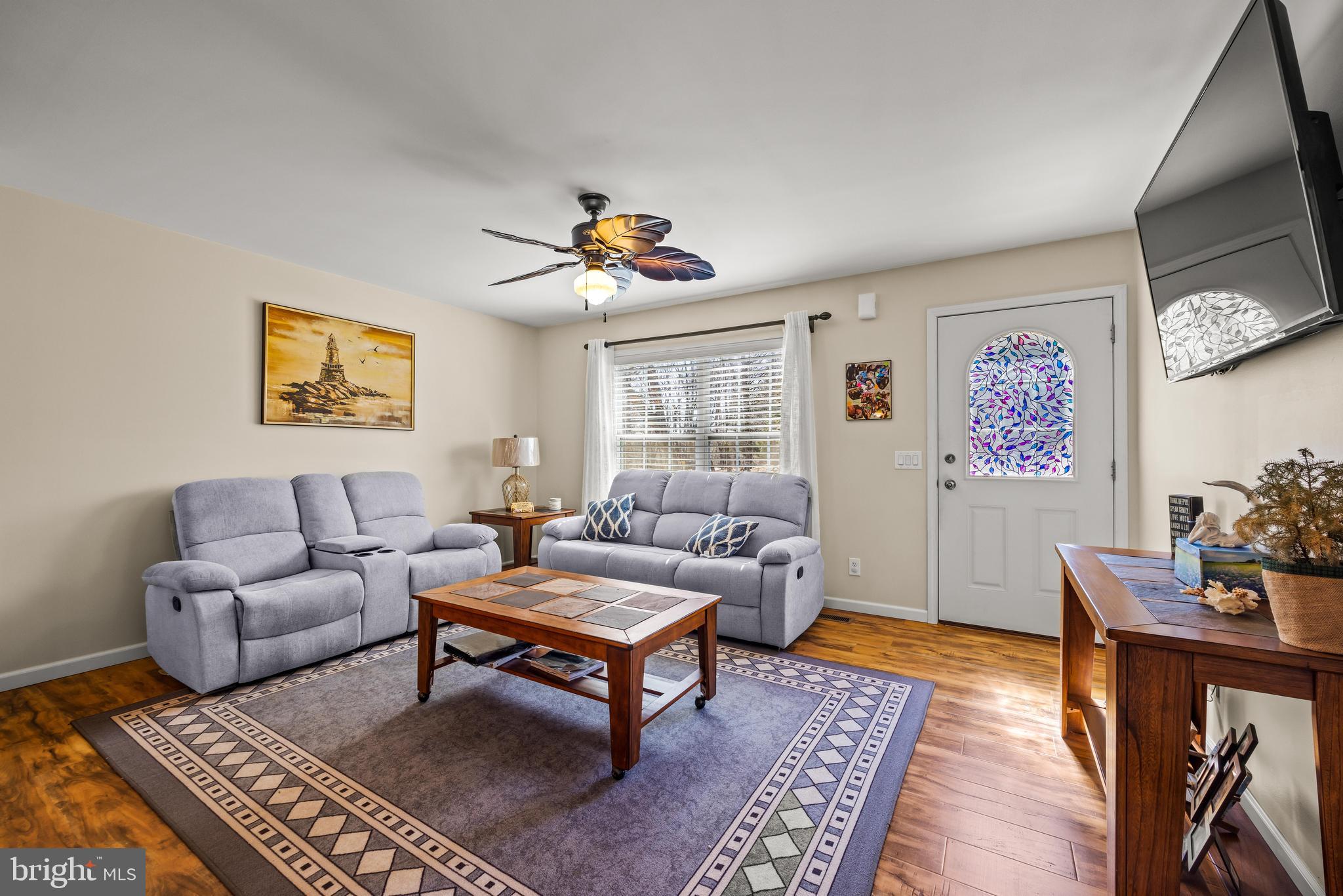 141 Pine Trail Delta, PA 17314 - Photo 6 of 44 a living room with furniture and wooden floor