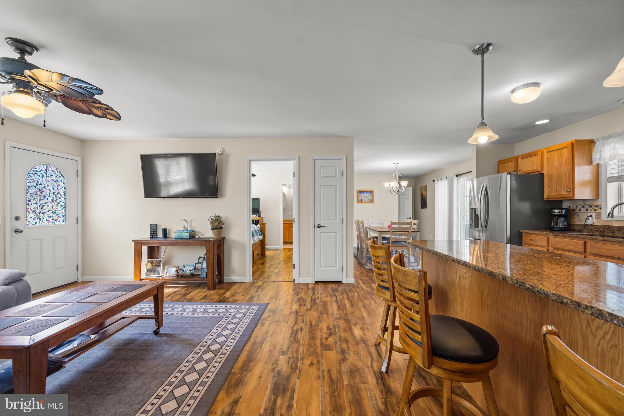 141 Pine Trail Delta, PA 17314 - Photo 7 of 44 a living room with furniture and a flat screen tv