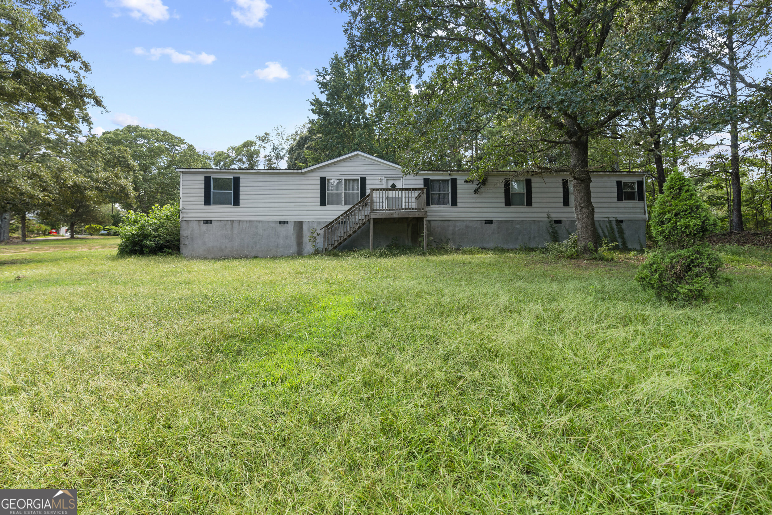 3016 Candler Road Gainesville, GA 30507 - Photo 1 of 1 a front view of a house with yard