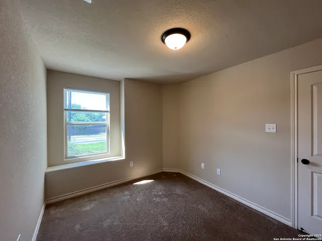 a bathroom with a white bath tub