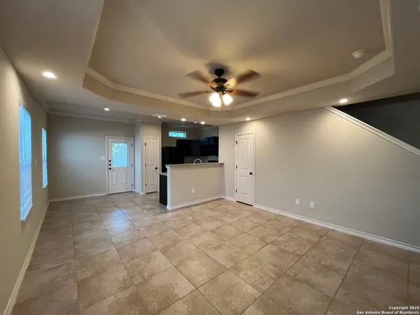 a view of a livingroom with a kitchen