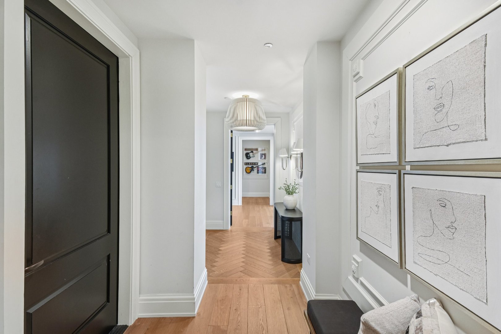 1109 West Washington Boulevard, Unit 8A Chicago, IL 60607 - Photo 11 of 51 a view of a hallway with wooden floor and furniture