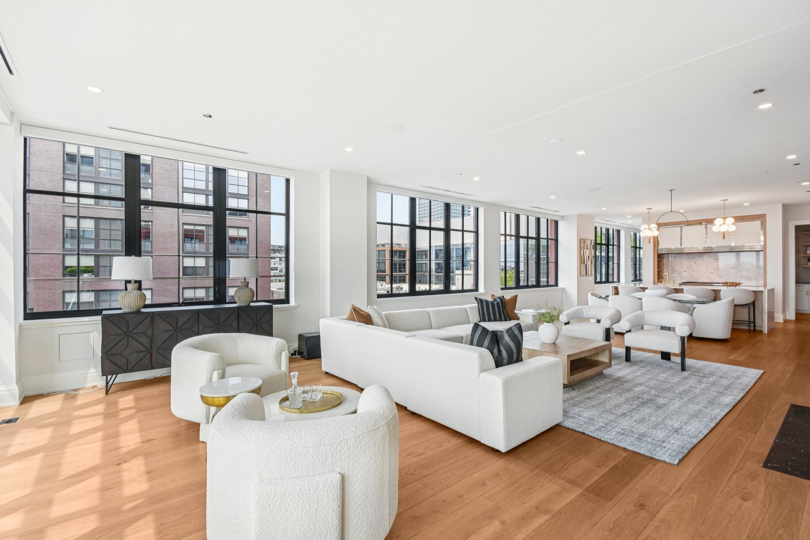 1109 West Washington Boulevard, Unit 8A Chicago, IL 60607 - Photo 13 of 51 a living room with furniture and a large window