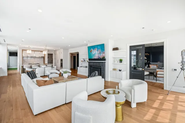 a living room with furniture and a table