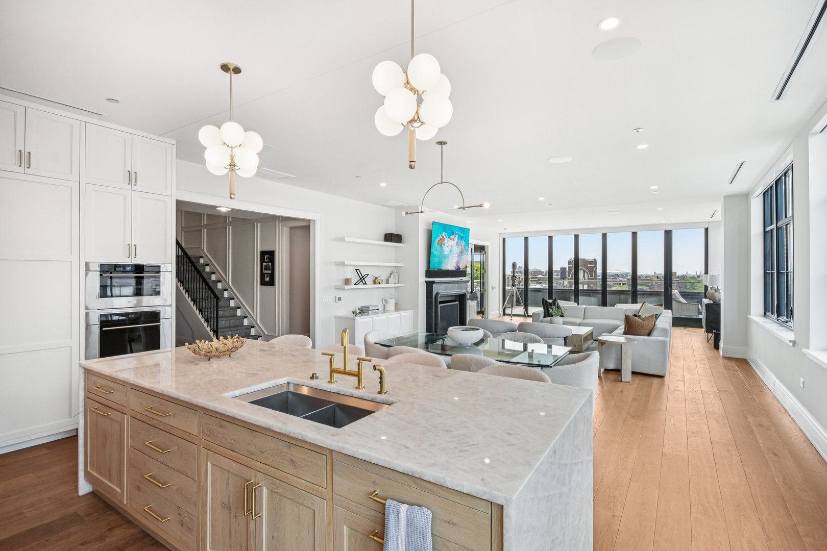 1109 West Washington Boulevard, Unit 8A Chicago, IL 60607 - Photo 18 of 51 a kitchen with sink refrigerator and large window