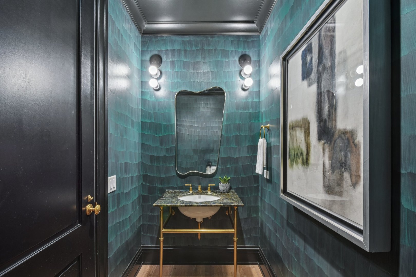 1109 West Washington Boulevard, Unit 8A Chicago, IL 60607 - Photo 20 of 51 a bathroom with a mirror and a shower