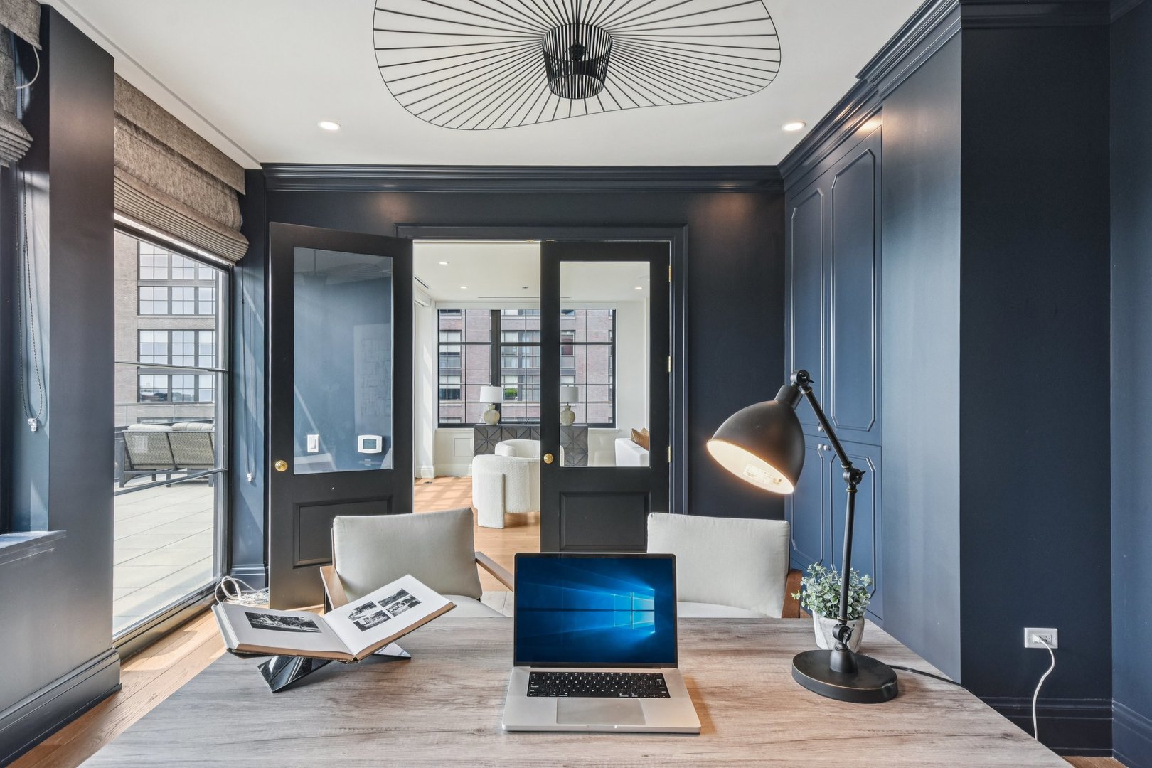 1109 West Washington Boulevard, Unit 8A Chicago, IL 60607 - Photo 23 of 51 a living room with furniture and a large window