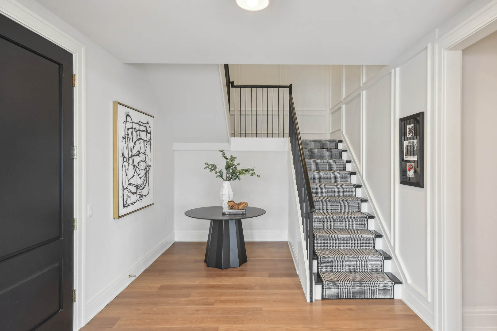1109 West Washington Boulevard, Unit 8A Chicago, IL 60607 - Photo 28 of 51 a view of an entryway with wooden floor
