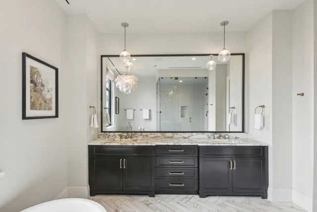 a spacious bathroom with a shower and a toilet