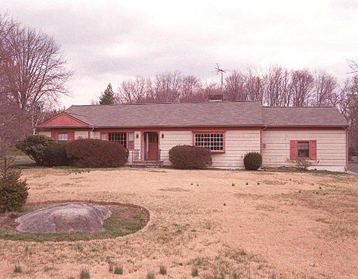 58 Doolittle Road Stamford, CT 06902 - Photo 1 of 1 a view of a house with a yard