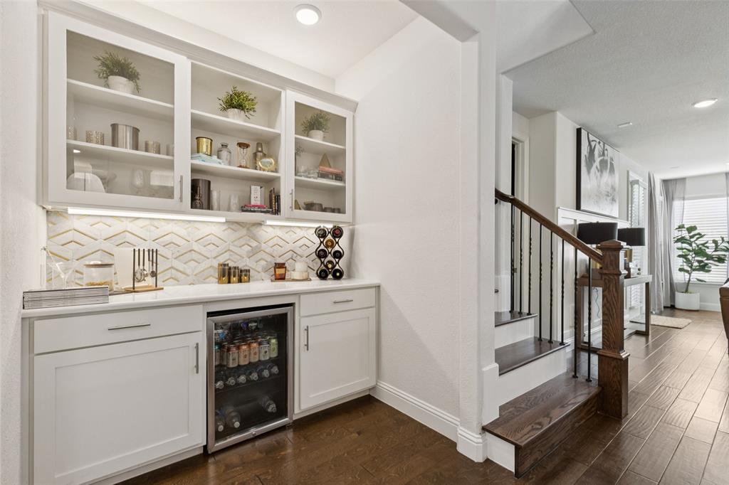 2236 Madison Street Carrollton, TX 75010 - Photo 11 of 37 a kitchen with stainless steel appliances granite countertop a stove and a sink