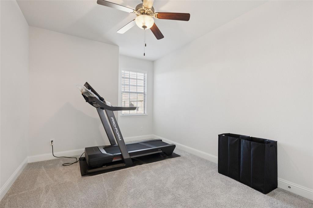 2236 Madison Street Carrollton, TX 75010 - Photo 17 of 37 a view of a room with gym equipment