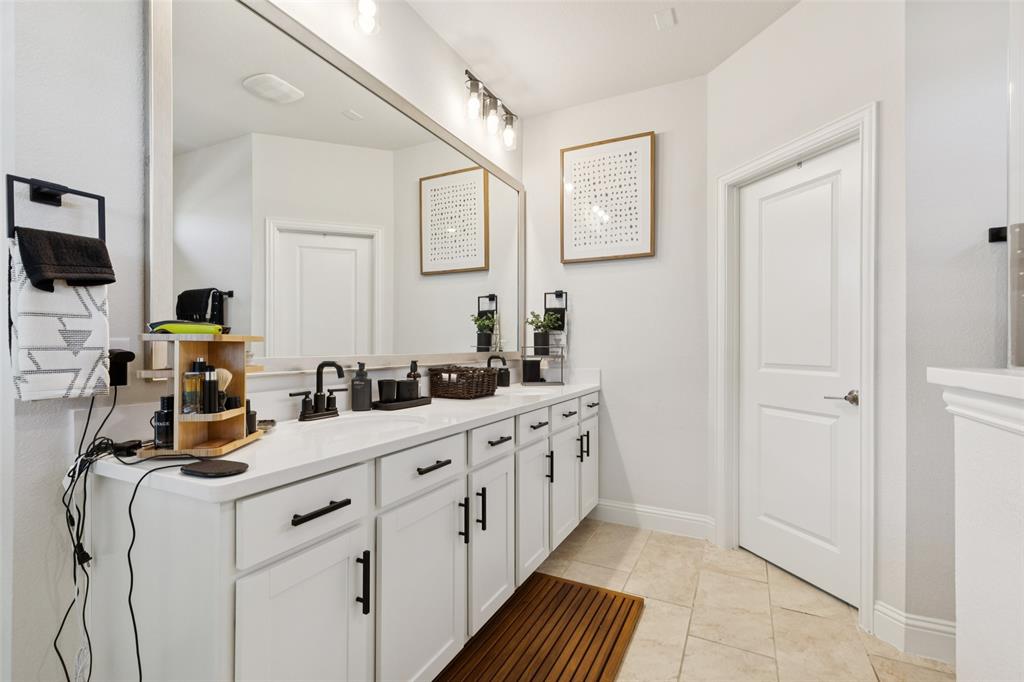 2236 Madison Street Carrollton, TX 75010 - Photo 24 of 37 a kitchen that has cabinets and sink