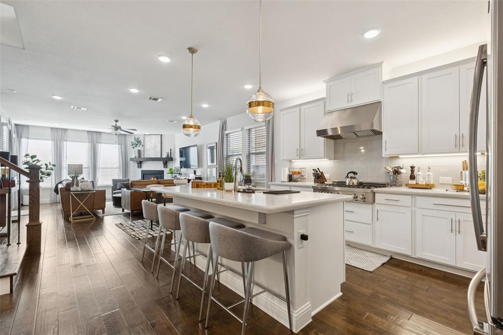 2236 Madison Street Carrollton, TX 75010 - Photo 3 of 37 a kitchen with lots of counter top space and furniture