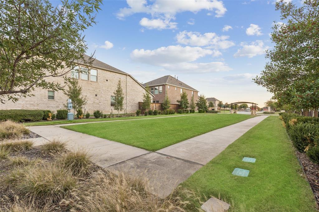 2236 Madison Street Carrollton, TX 75010 - Photo 35 of 37 a view of field with tree in the background