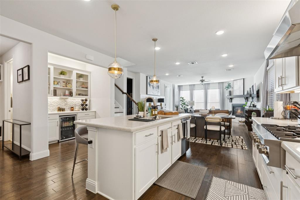 2236 Madison Street Carrollton, TX 75010 - Photo 4 of 37 a kitchen with lots of counter top space and dining table