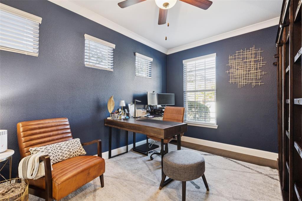 2236 Madison Street Carrollton, TX 75010 - Photo 10 of 37 a view of a workspace with furniture and a window