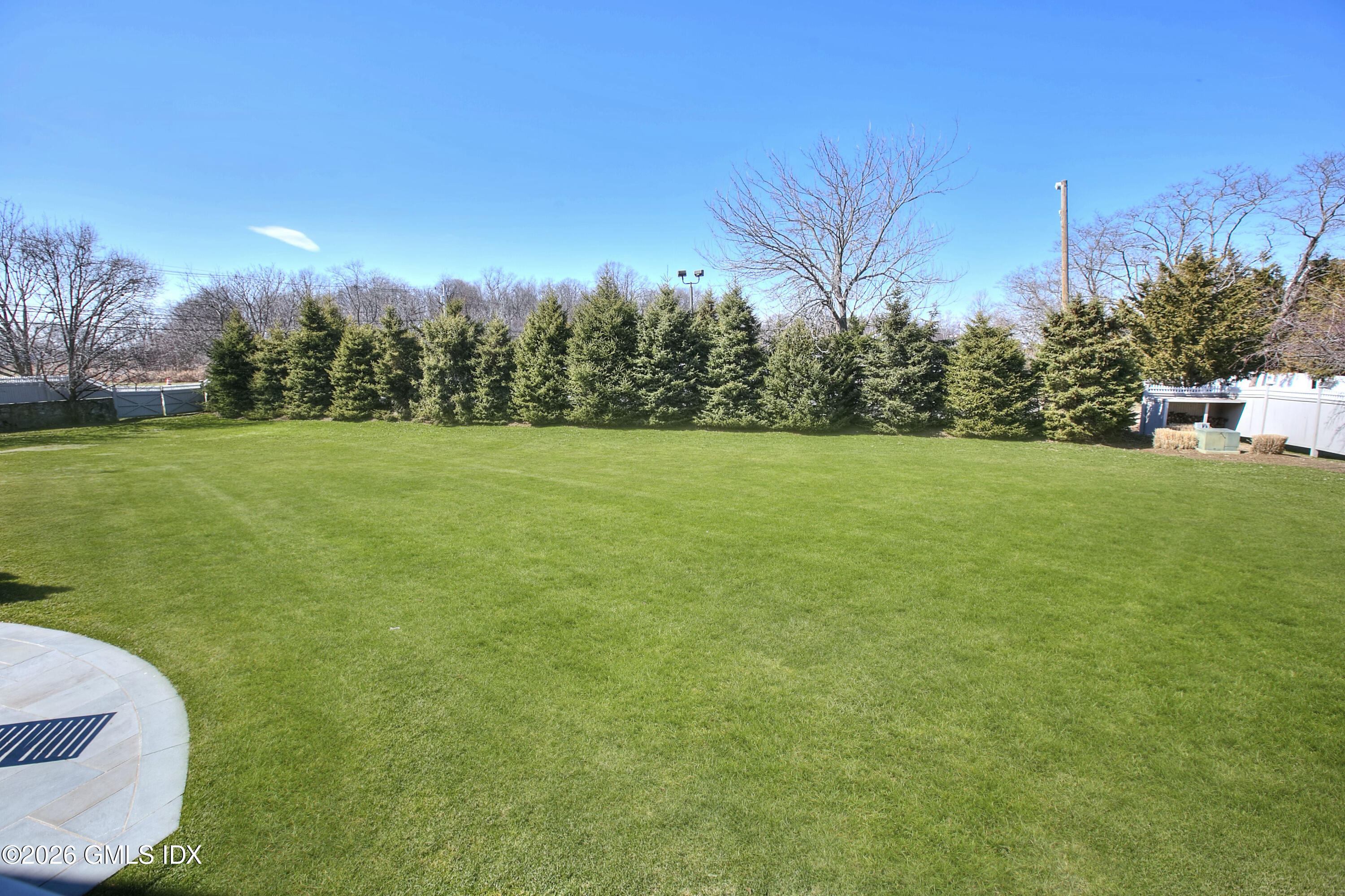 3 Shorehaven Road Norwalk, CT 06855 - Photo 36 of 40 a view of a big yard with a fountain