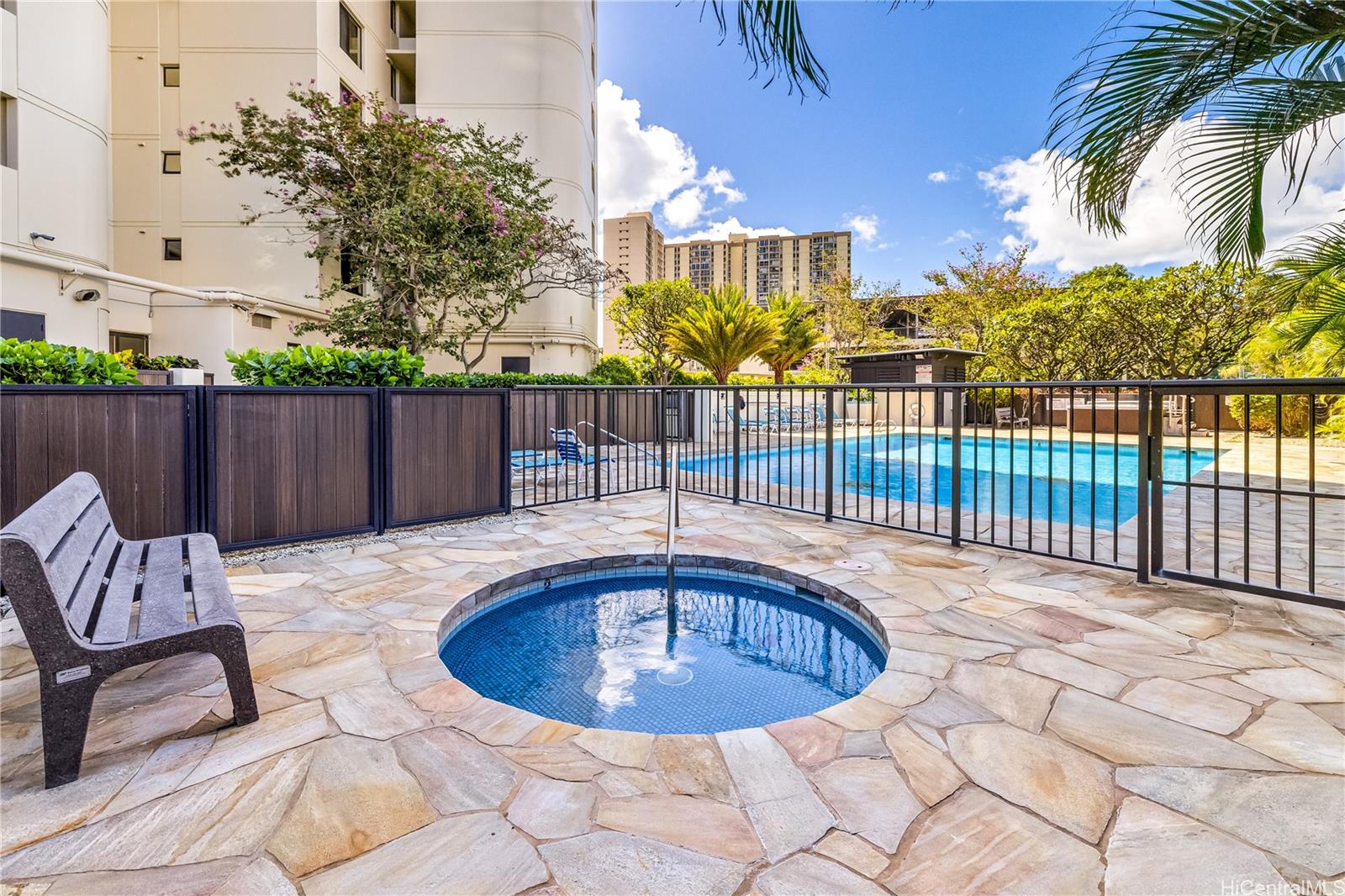 990 Ala Nanala Street, Unit 17A Honolulu, HI 96818 - Photo 14 of 24 a view of a swimming pool with a patio