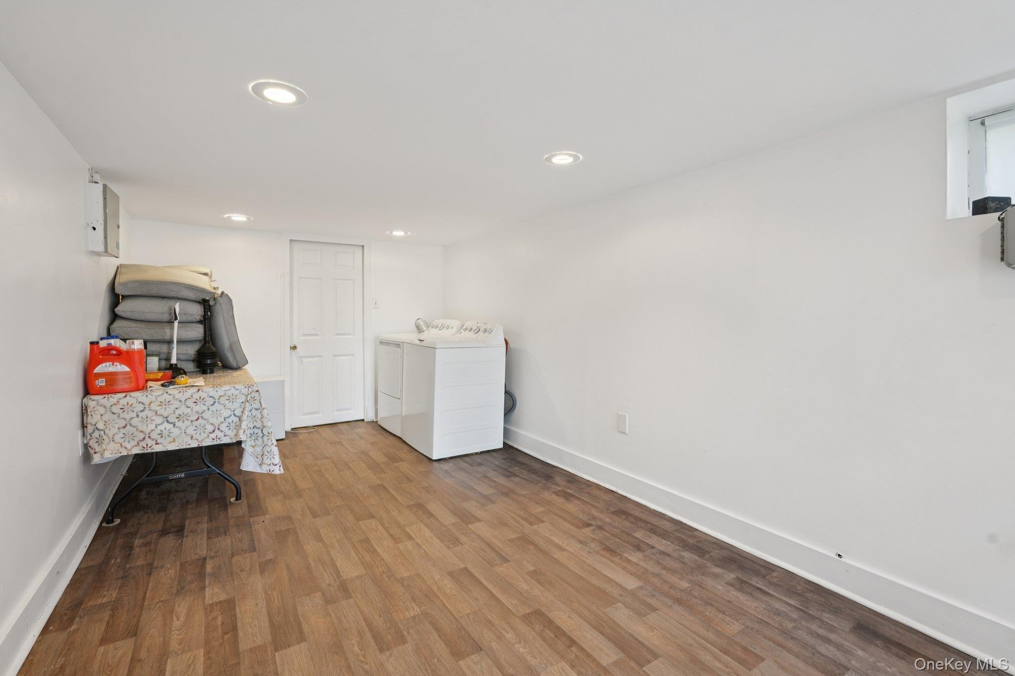 17 Pine Hill Road Highland Mills, NY 10930 - Photo 18 of 35 Laundry area featuring recessed lighting, wood finished floors, washer and clothes dryer