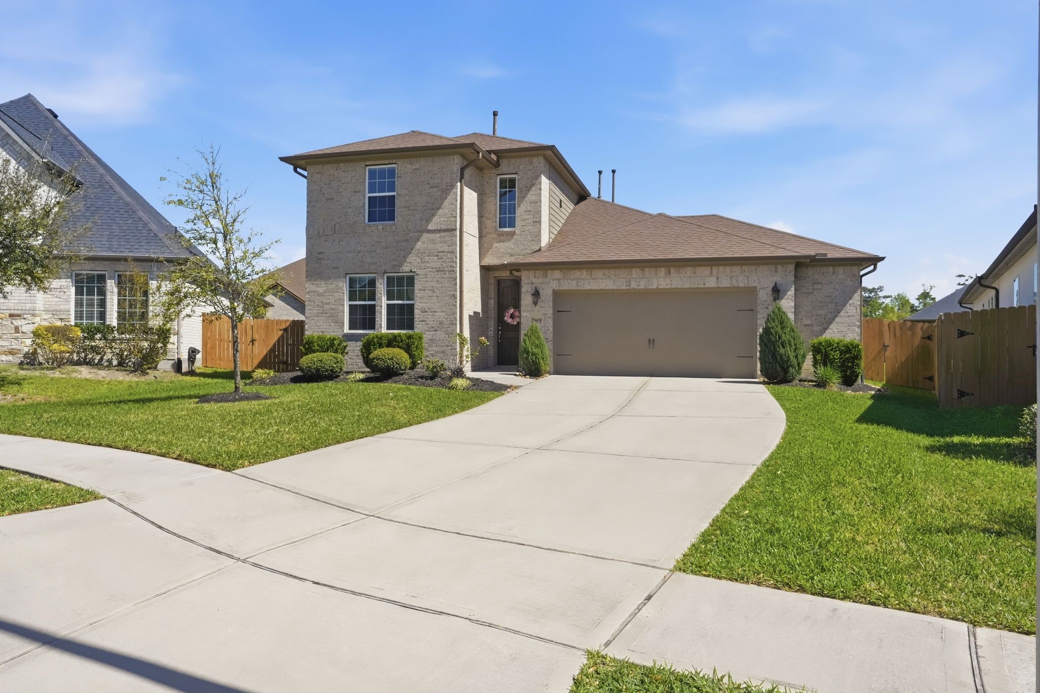 2809 Andante Green Drive Spring, TX 77386 - Photo 2 of 50 a front view of a house with a yard